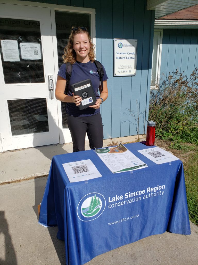 Lake Simcoe Region Conservation Authority staff member standing at registration desk